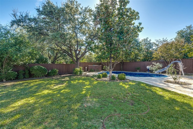 view of yard with a fenced backyard