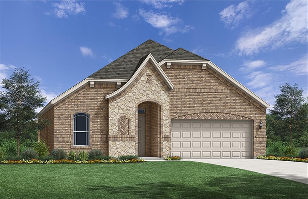 view of front facade featuring a front yard and a garage