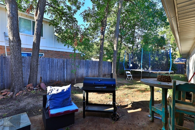 view of yard featuring a trampoline