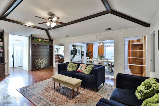 living room featuring ceiling fan with notable chandelier, lofted ceiling with beams, and dark hardwood / wood-style floors