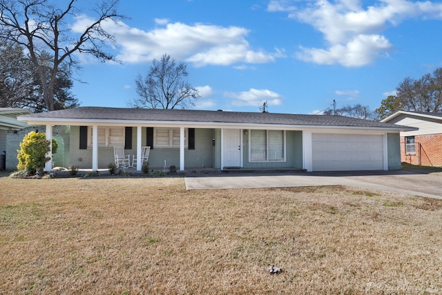 ranch-style house with a garage, a porch, and a front lawn