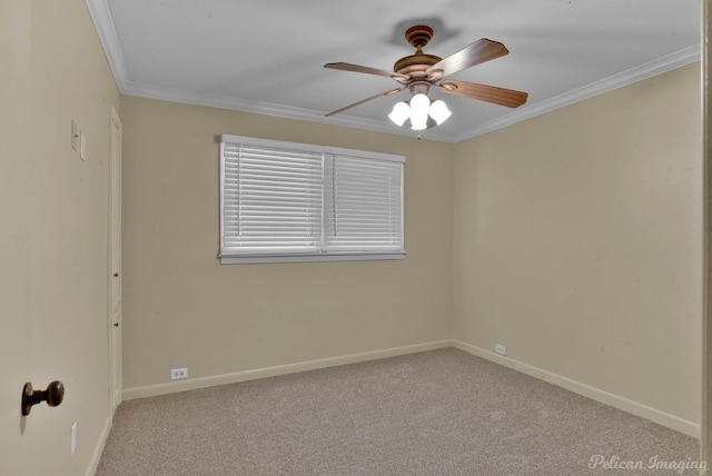 empty room featuring ceiling fan, ornamental molding, and light carpet