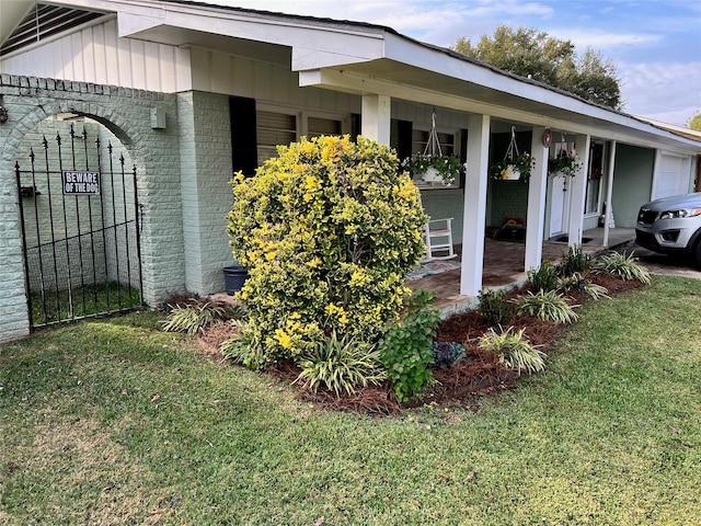 view of property exterior with a lawn