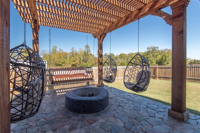 view of patio / terrace featuring a fire pit and a pergola