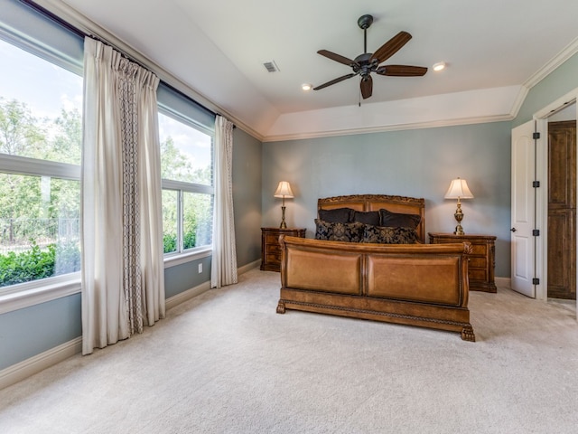 bedroom with light carpet, ornamental molding, and ceiling fan