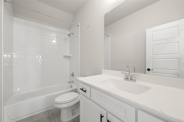 full bath featuring shower / bathtub combination, toilet, tile patterned flooring, and vanity