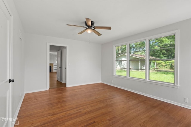112 Pennsylvania Ave, Shreveport, LA 71105 - unfurnished room with wood finished floors, baseboards, and a ceiling fan