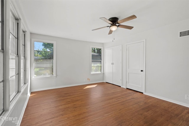 112 Pennsylvania Ave, Shreveport, LA 71105 - spare room featuring wood finished floors, baseboards, a ceiling fan, and visible vents