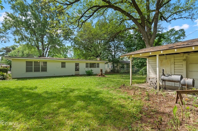 112 Pennsylvania Ave, Shreveport, LA 71105 - rear view of property featuring fence and a lawn