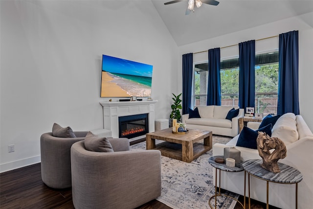 living room with dark hardwood / wood-style floors, high vaulted ceiling, and ceiling fan