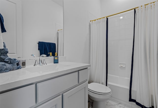 full bathroom with vanity, shower / bath combo with shower curtain, and toilet