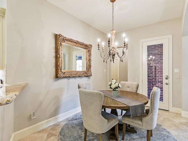 dining area with a notable chandelier