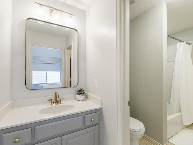 full bathroom with toilet, vanity, and shower / tub combo with curtain