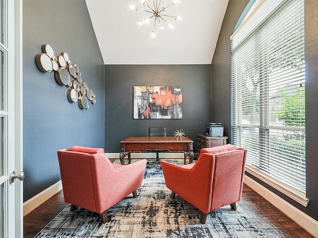 home office with vaulted ceiling, dark hardwood / wood-style flooring, and a chandelier