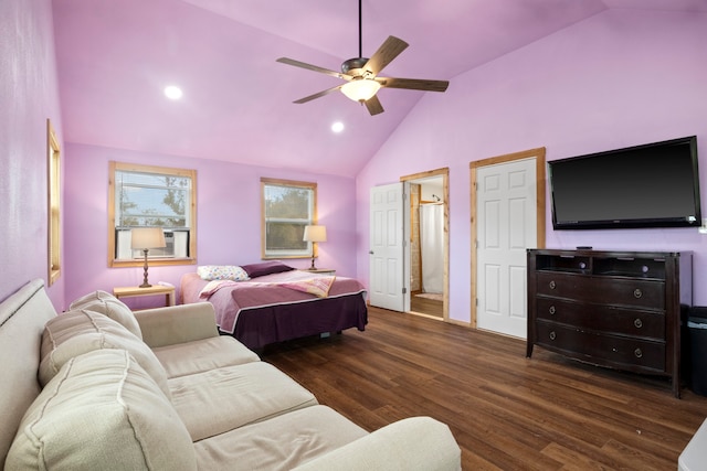 bedroom featuring dark hardwood / wood-style flooring, lofted ceiling, and ceiling fan