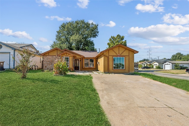 single story home featuring a front yard