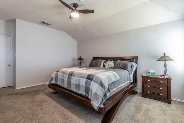 418 Mcmurtry Dr, Arlington, TX 76002 - carpeted bedroom featuring vaulted ceiling, baseboards, ceiling fan, and a textured ceiling