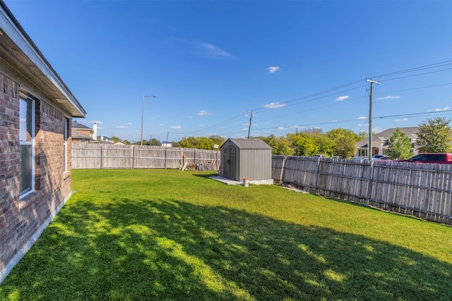 view of yard featuring a storage shed