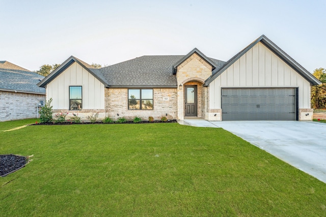 modern farmhouse style home with a garage and a front yard