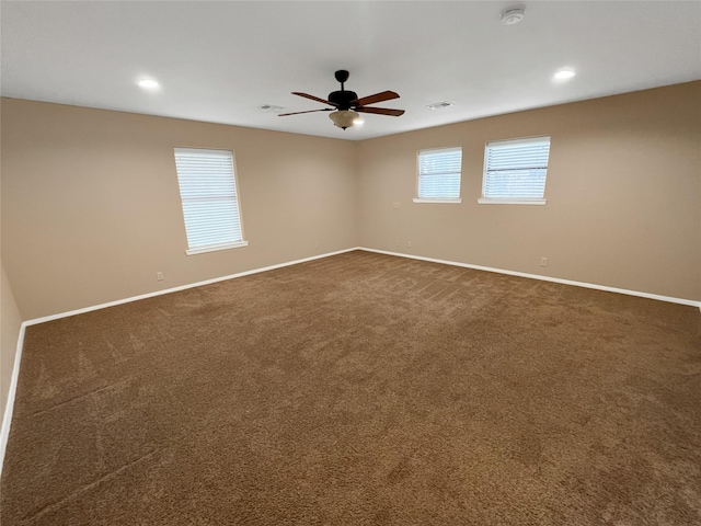 1062 Jp Cave Rd, Sherman, TX 75090 - empty room featuring a smoke detector, baseboards, dark carpet, a ceiling fan, and recessed lighting