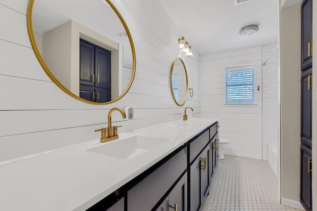 1062 Jp Cave Rd, Sherman, TX 75090 - bathroom featuring toilet, double vanity, tile patterned floors, and bathing tub / shower combination