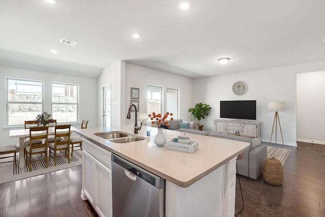 kitchen featuring sink, white cabinetry, dark hardwood / wood-style floors, dishwasher, and a kitchen island with sink