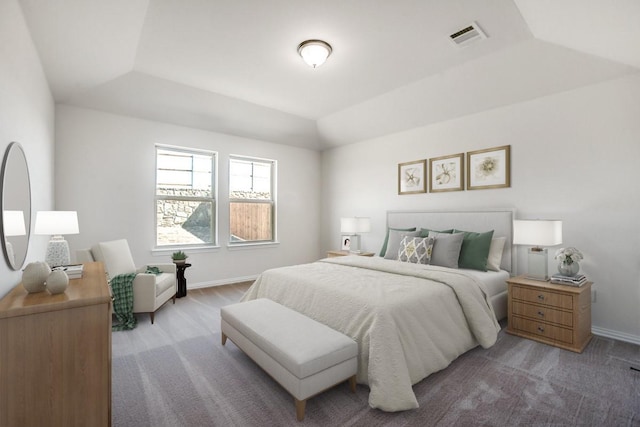 carpeted bedroom featuring vaulted ceiling