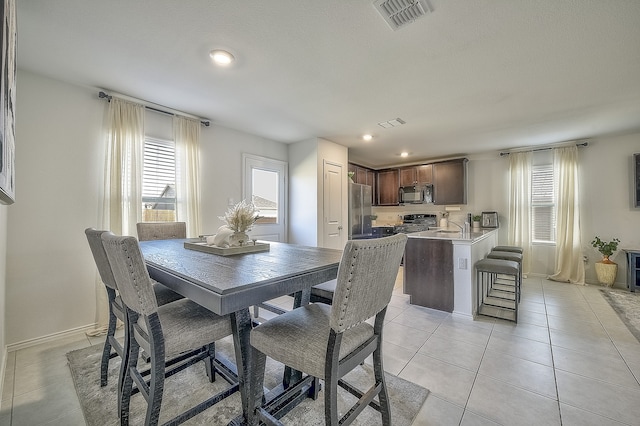 view of tiled dining space