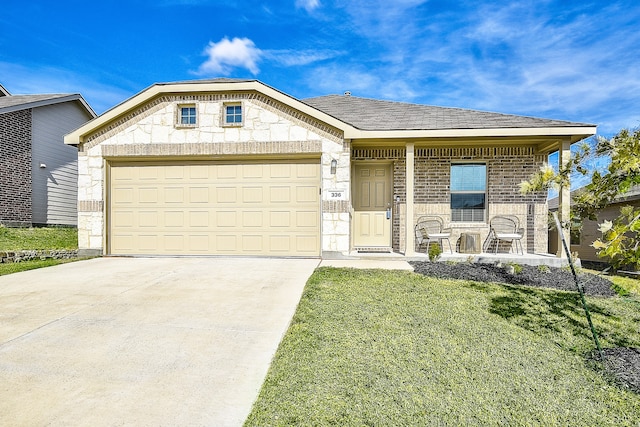 view of front of home featuring a garage, covered porch, and a front lawn