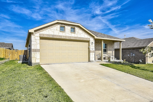 ranch-style house featuring central AC unit, a front yard, and a garage