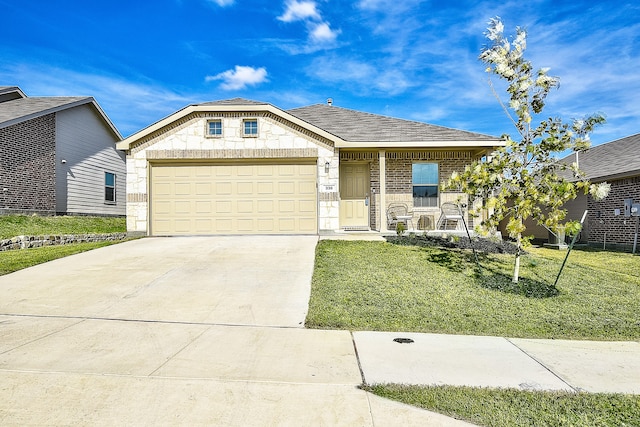 view of front facade with a front yard and a garage