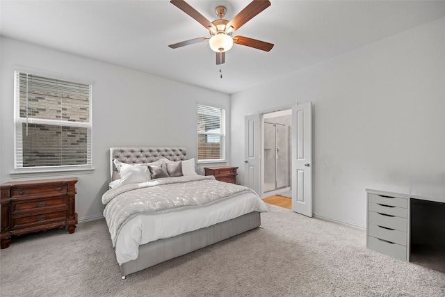 bedroom featuring light colored carpet and ceiling fan