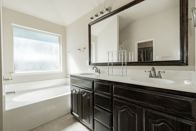 602 Tumbleweed Dr, Forney, TX 75126 - full bathroom with double vanity, a garden tub, and tile patterned flooring