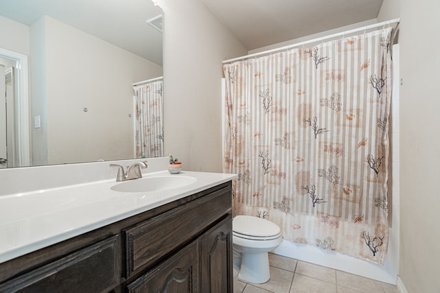 full bathroom featuring toilet, shower / bath combo, vanity, and tile patterned flooring