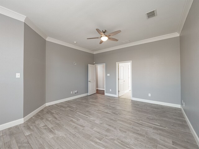 spare room with ceiling fan, light hardwood / wood-style floors, and ornamental molding