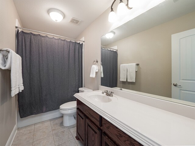 full bathroom featuring tile patterned flooring, vanity, shower / bath combination with curtain, and toilet