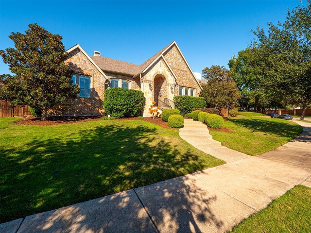 view of front of house with a front lawn