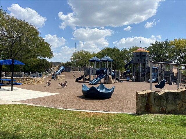 view of jungle gym with a yard