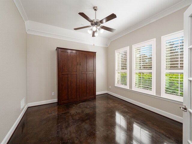 unfurnished bedroom featuring ceiling fan and crown molding