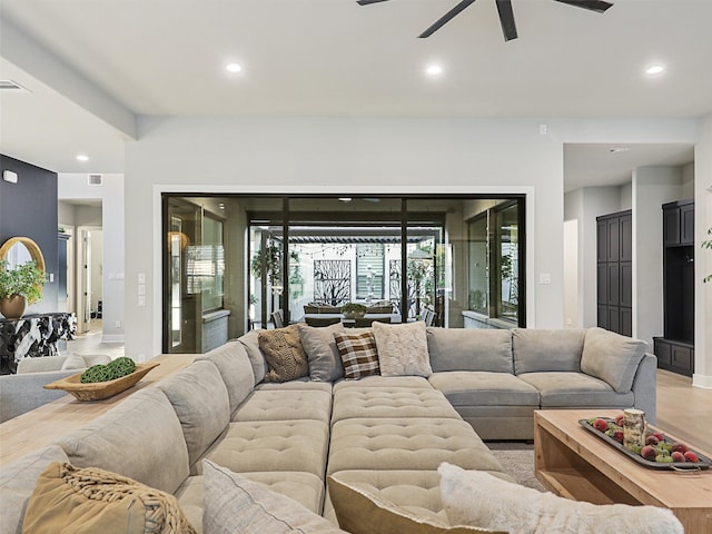 living room with ceiling fan