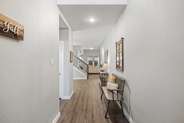 hall featuring hardwood / wood-style flooring