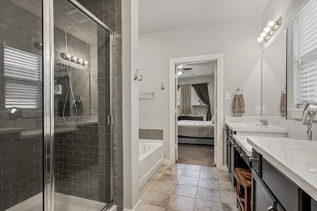 bathroom featuring vanity, separate shower and tub, and ceiling fan