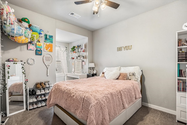 carpeted bedroom featuring ceiling fan