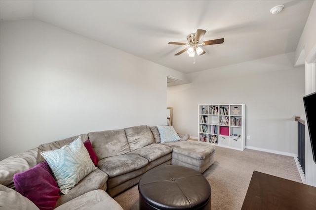 living room with carpet, vaulted ceiling, and ceiling fan