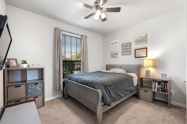 bedroom featuring ceiling fan and light colored carpet