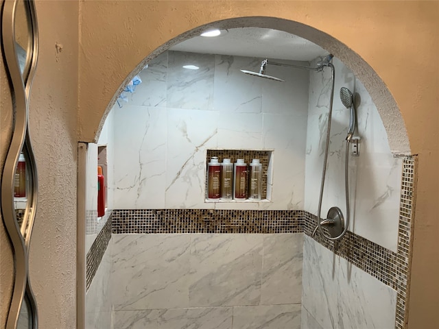 interior space with a tile shower