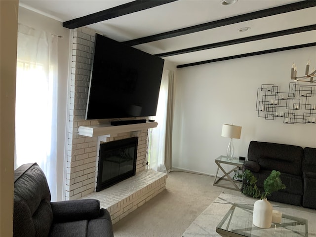 living room featuring light carpet, beamed ceiling, a wealth of natural light, and a brick fireplace