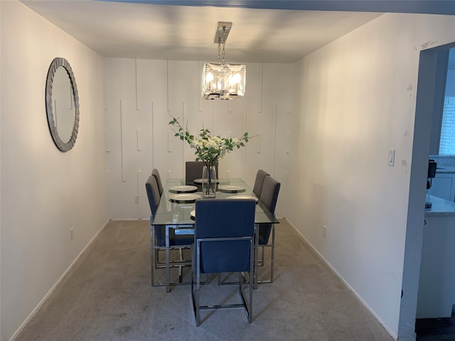 view of carpeted dining space