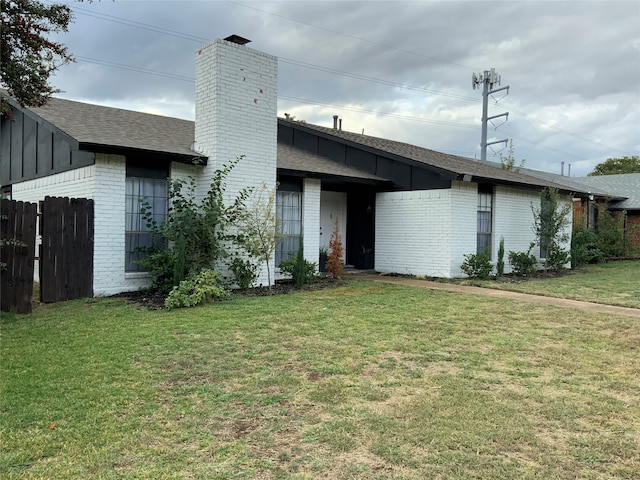 exterior space with a front yard