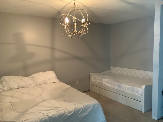 carpeted bedroom with an inviting chandelier